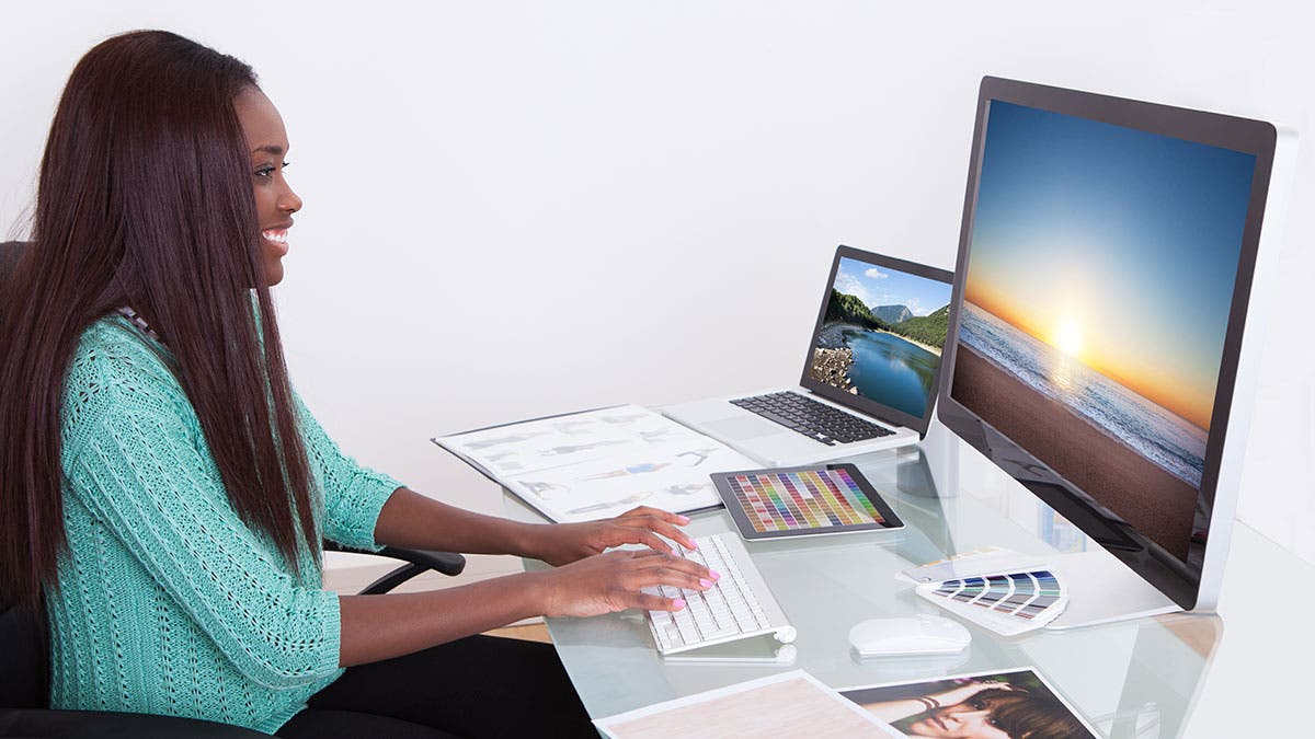 woman photo editor working computer monitor