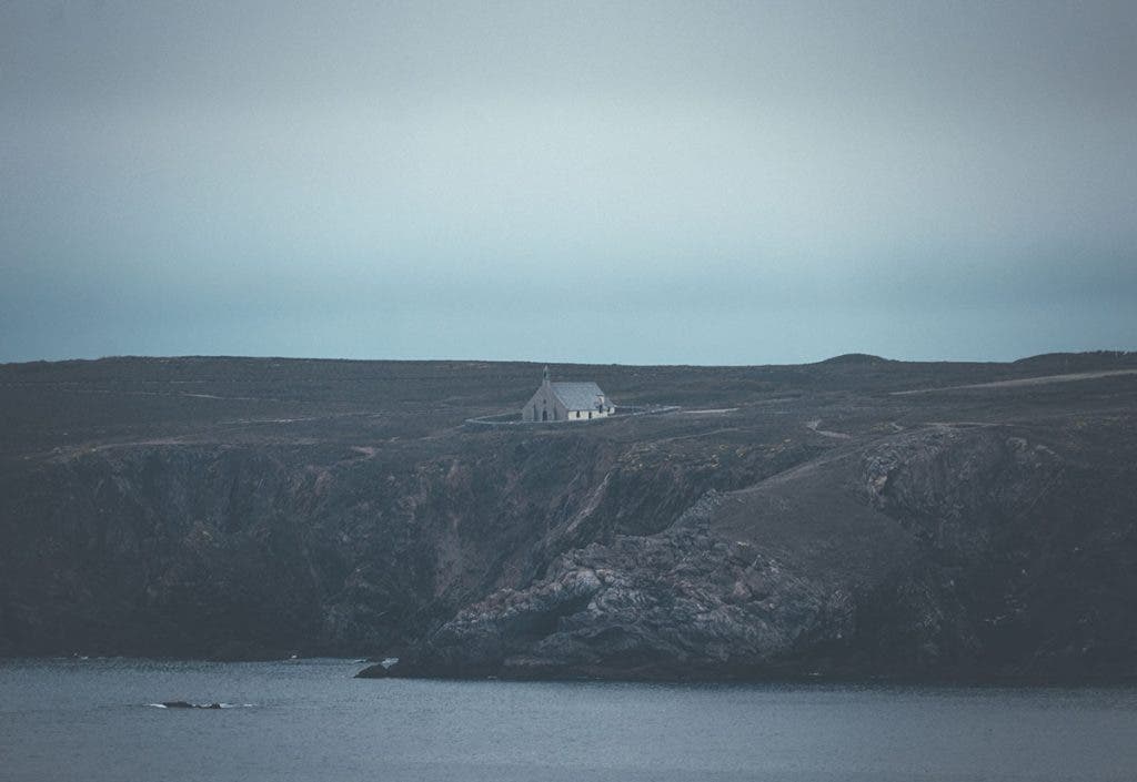 noise in photography landscape photo with house on cliff