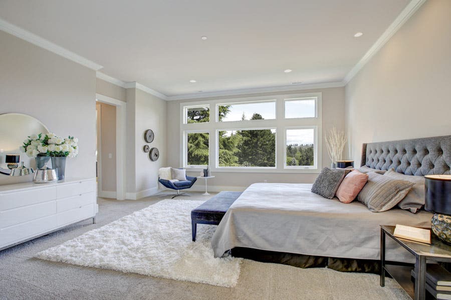 Light filled bedroom with a king size bed