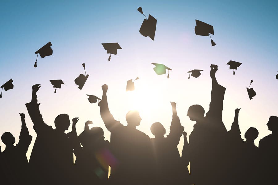 silhouettes of many happy students