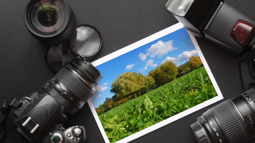 dslr camera lens and image on black background