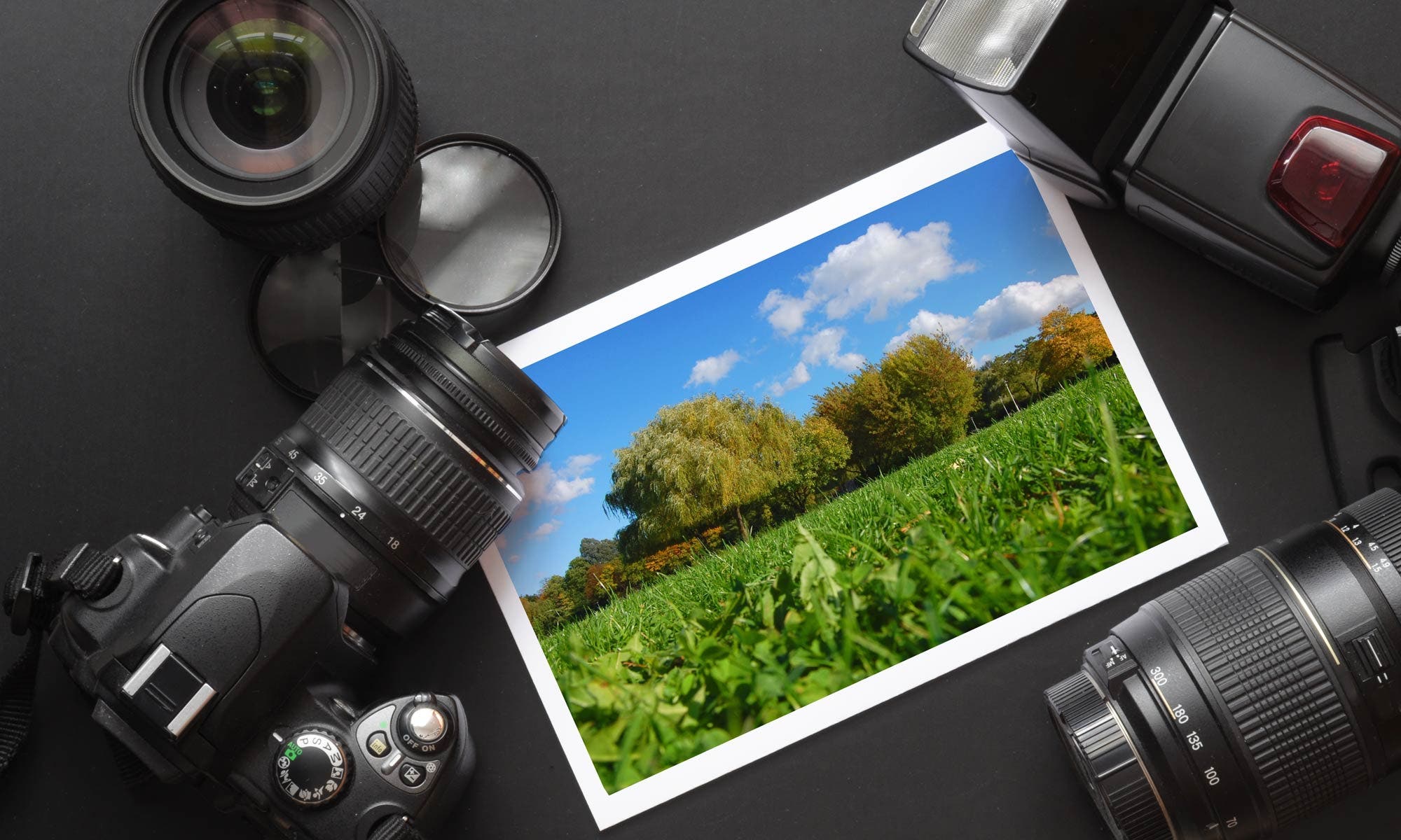 dslr camera lens and image on black background