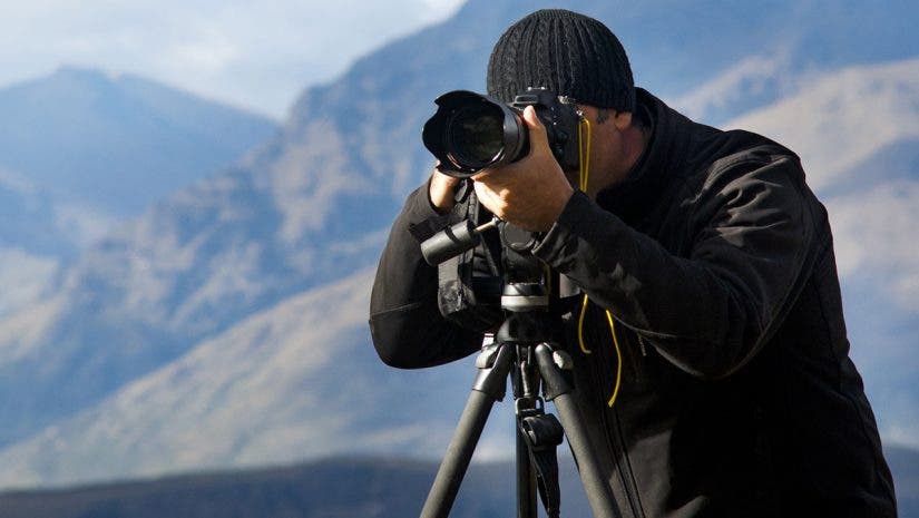 photographer tripod dslr camera