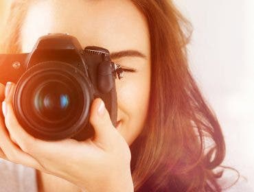 woman with dslr camera