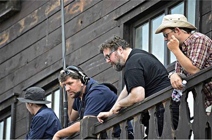 Director/Screenwriter Martin Koolhoven (2nd to right, wearing glasses) on the set of his latest film "Brimstone."