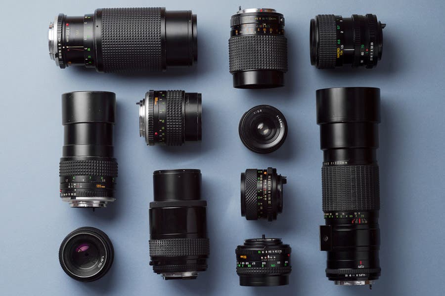 camera lens well organized over blue background