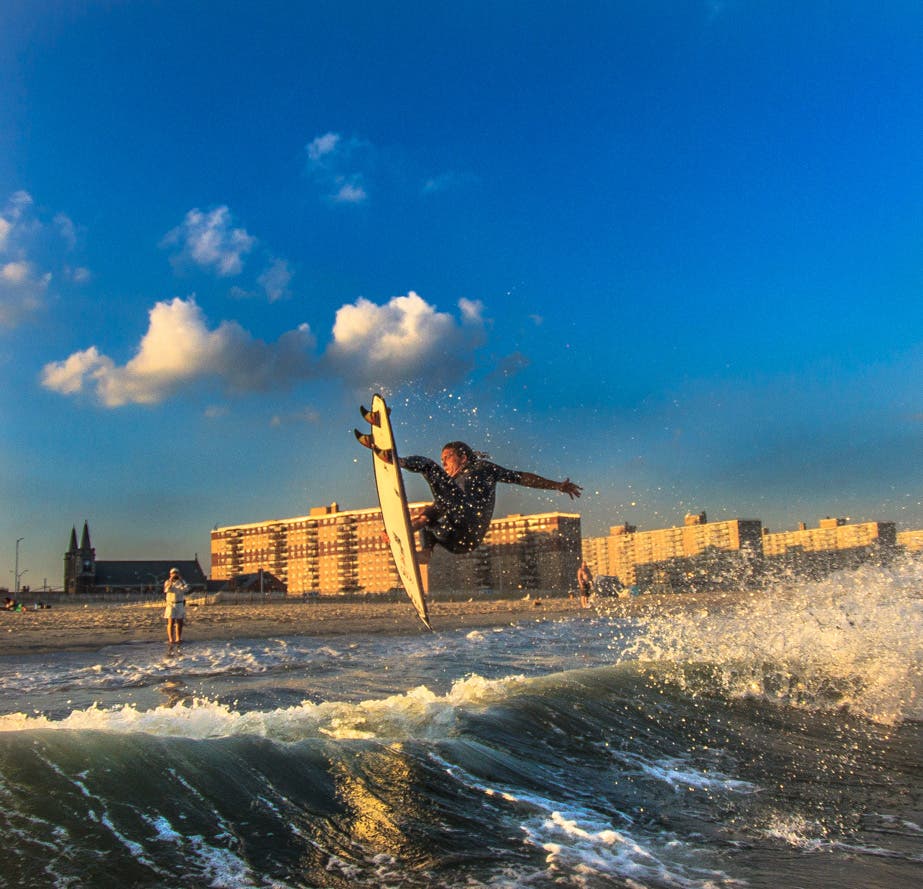 Professional surfer TJ Gumiela. Shot with Canon 1D with Tokina 10-17, ISO 200, 1/1000, F6.3. Shutter Priority Mode. Photo by Mike Nelson, Long Beach, NY.