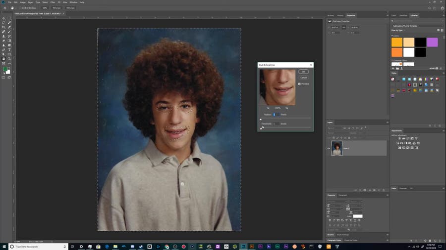 the Dust & Scratches filter in Photoshop