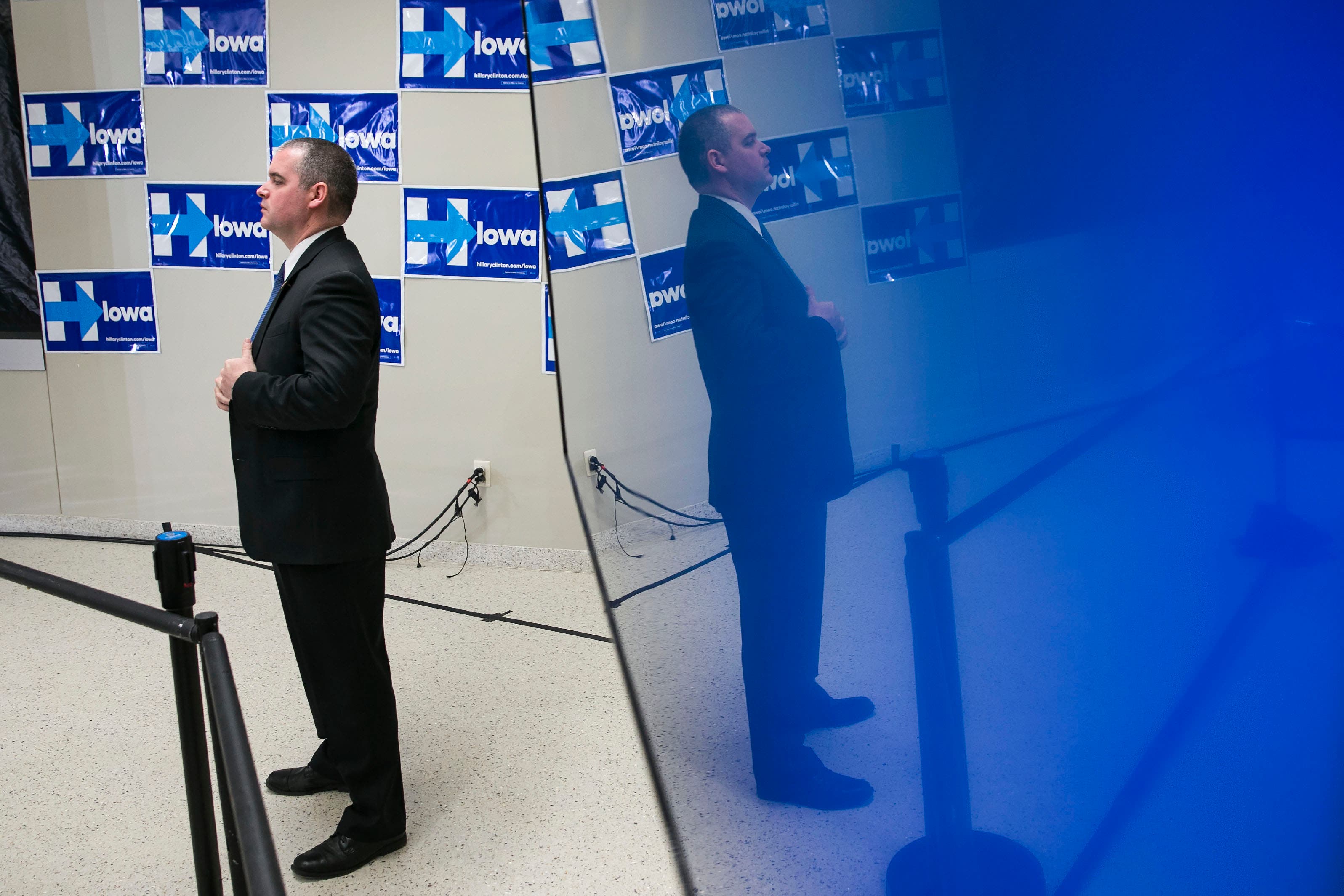 UNITED STATES - JANUARY 24 - A U.S. Secret Service agent stands watch before Democratic presidential candidate Hillary Rodham Clinton speaks at a Get Out the Caucus event with Sen. Cory Booker, D-N.J., at Vernon Middle School, in Marion, Iowa, Sunday, Jan. 24, 2016. (Photo By Al Drago/CQ Roll Call)