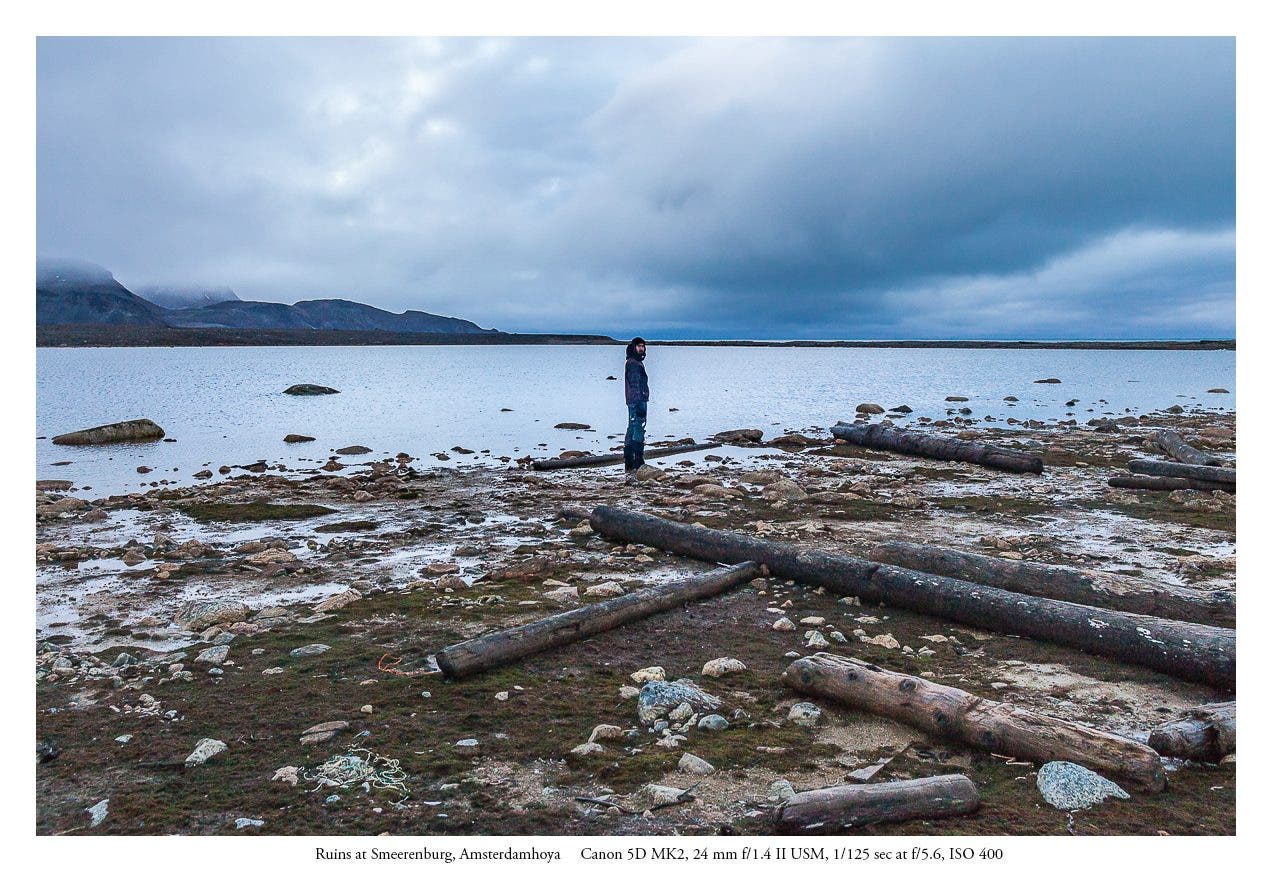 The heavy October rains, so unusual for the high arctic, washed away all snow cover revealing the archeological ruins of a 17th Century Dutch whaling station and ocean garbage that is regularly deposited on the tidal flats there on the northwestern coast of Spitzbergen. (Canon 5D MK2 24 mm 1.4 II USM) 1/125 sec at f/5.6 ISO 400
