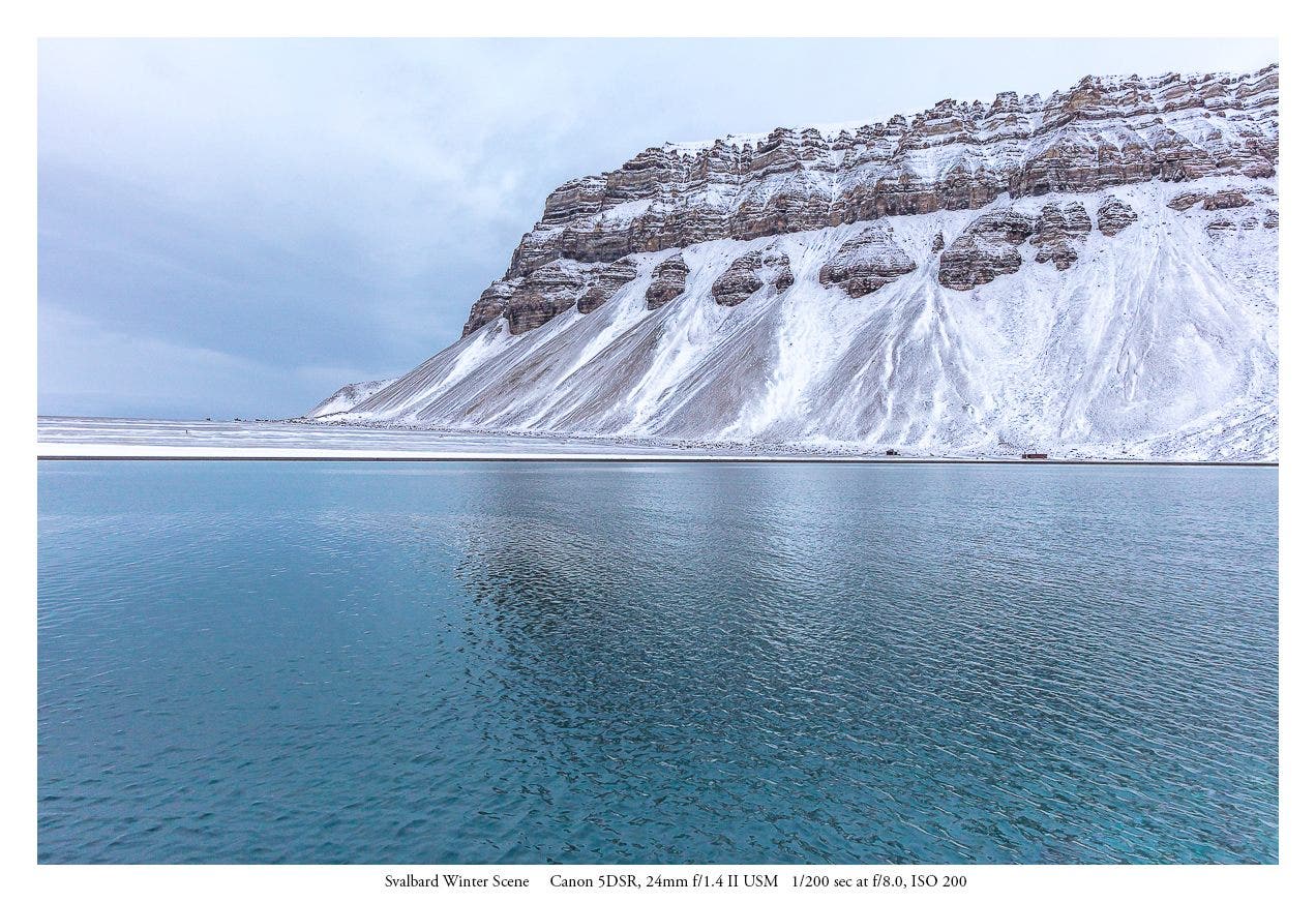 This view of snow on the mountains is more typical of what one might expect to see on the high arctic archeipelago of Svalbard. This photograph taken in early October was the last time we saw any snow in the mountains as we sailed between 78 degrees North and the beginning of the polar ice near 80 degrees. (Canon 5DSR, 24mm 1.4 II USM) 1/200 sec at f/8.0 ISO 200
