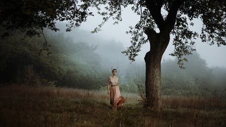 model walking in forest photography