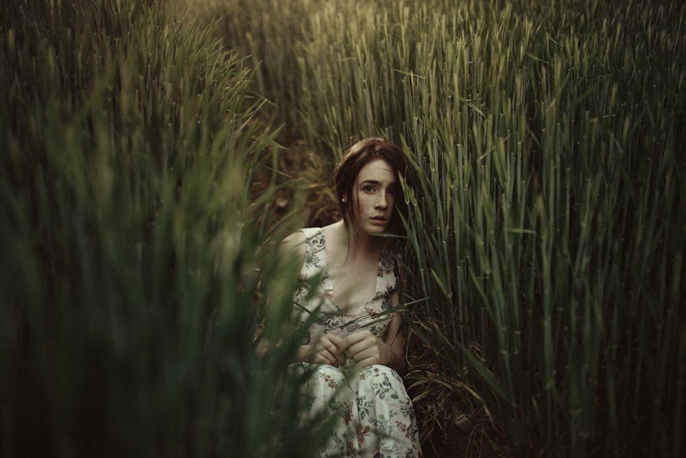 feminine beauty hide in grass