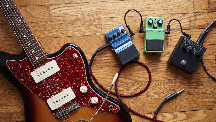 Guitar and Effects Pedals On The Floor