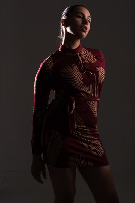 model wearing red suit