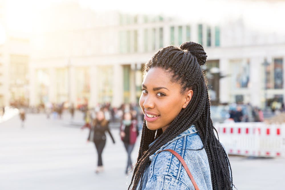 A woman’s portrait while strolling in the city
