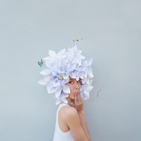 woman with flowers on her hair