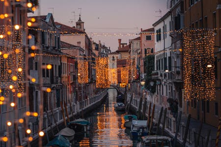 string lights around canal in venice travel photography