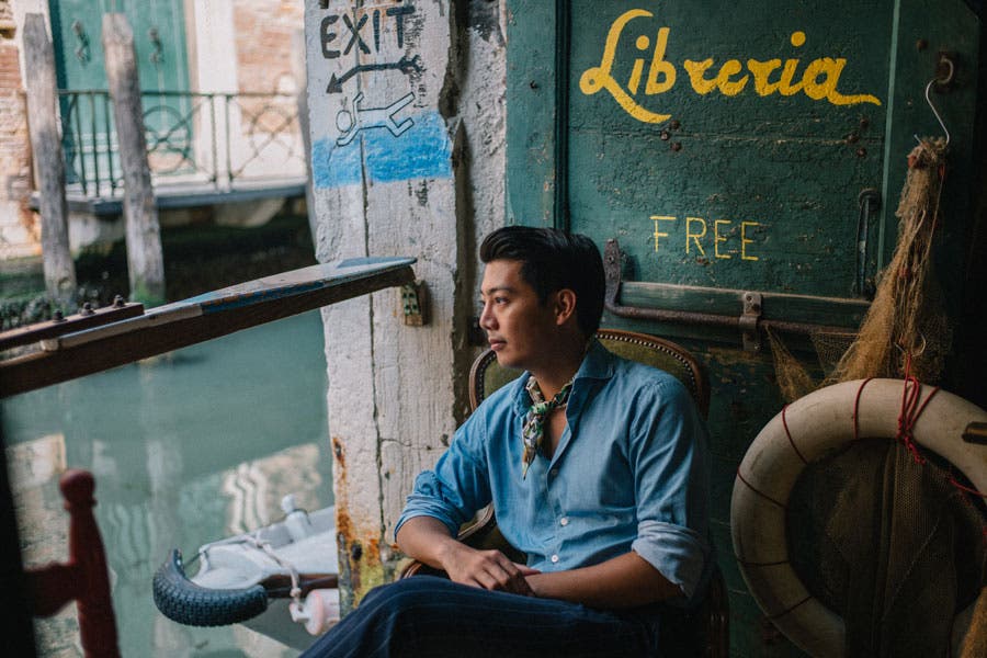 model sitting by the river travel photography
