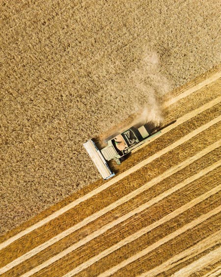ranch equipment in rice fields drone photography