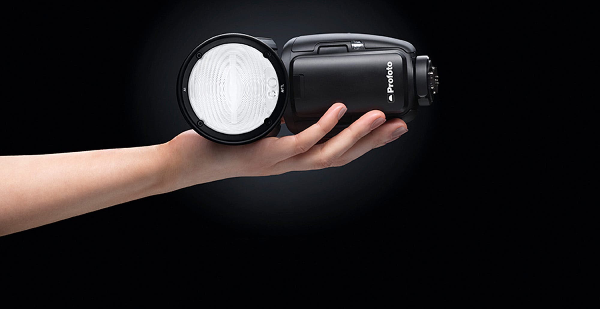 Profoto A1 AirTTL in hand banner