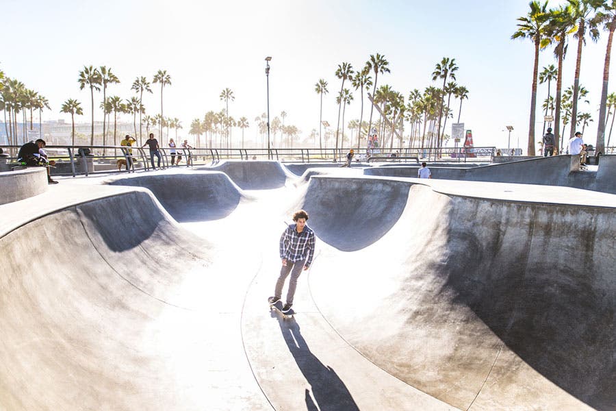 man on a skateboard in skate park