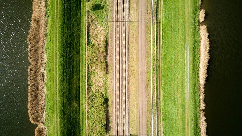 Drone photo of train tracks using vertical vantage point