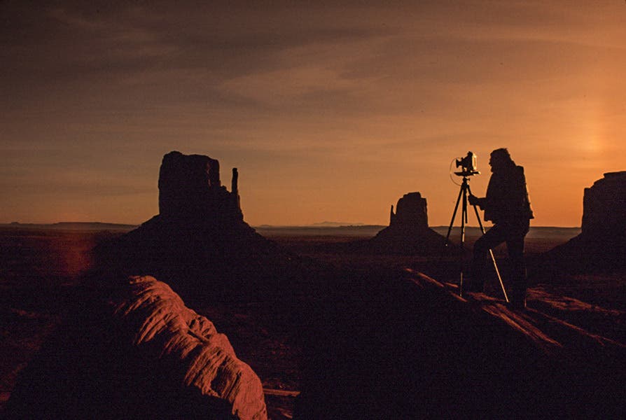 photographer taking a shot of monument valley