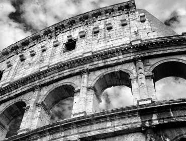 Monochrome black and white photo of Colosseum in Rome
