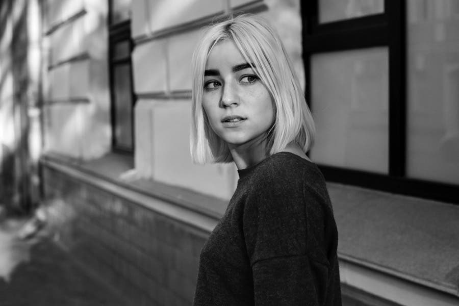 Monochrome black and white portrait of blonde woman
