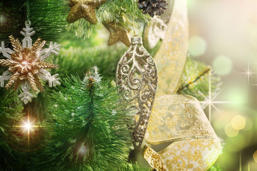 gold christmas tree ornament with starburst effects