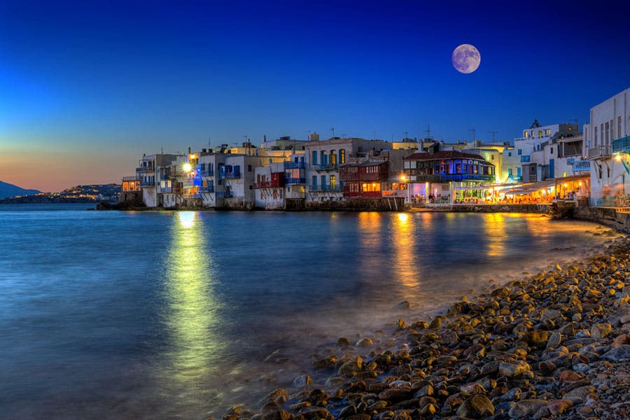 Moon hovering over Mykonos, Greece