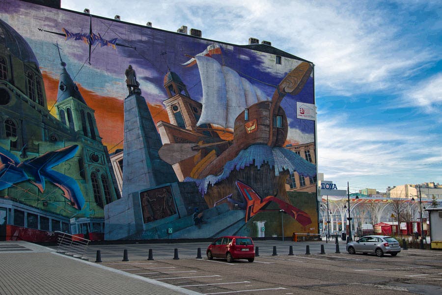towering street art at a carpark in Poland