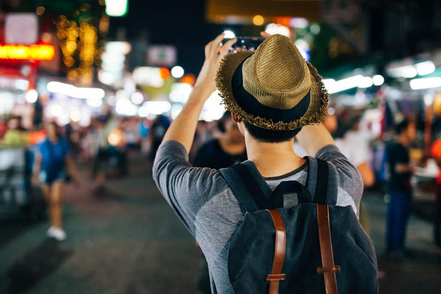 man doing street photography