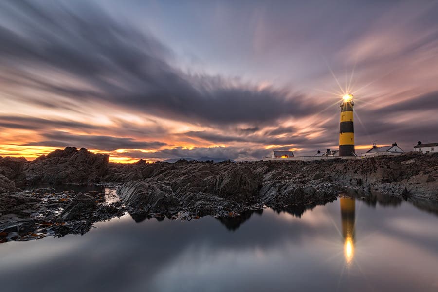 lighthouse during sunset with long exposure photography