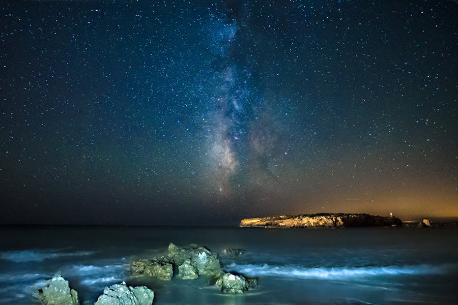 starry night sky over the beach in spain