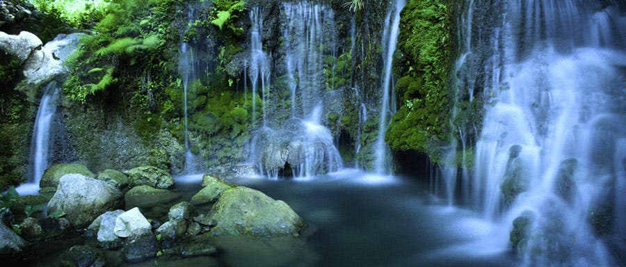 Waterfall scene with cool color temperature