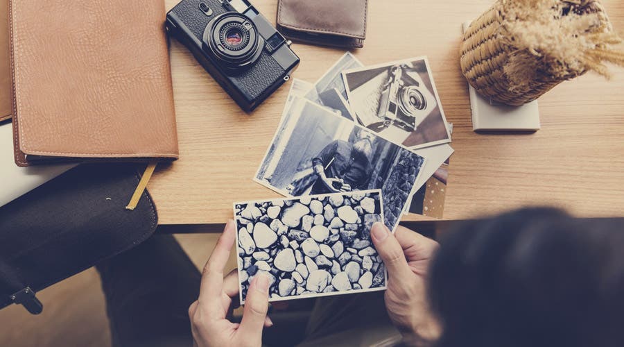Photographer selecting images for portfolio