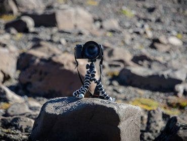 tabletop tripods mini tripods joby gorillapod with camera on beach rocks