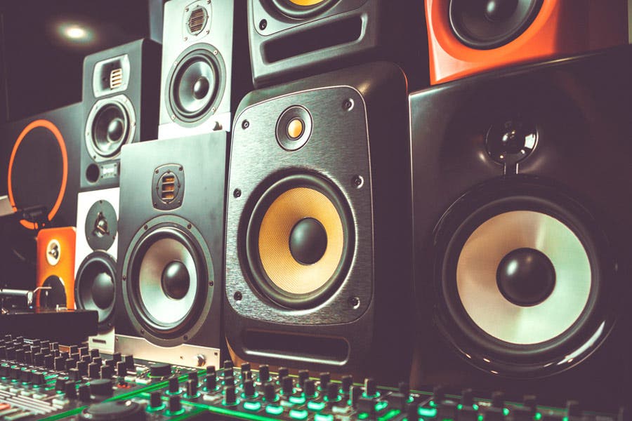 DJ shop with a stack of studio monitors