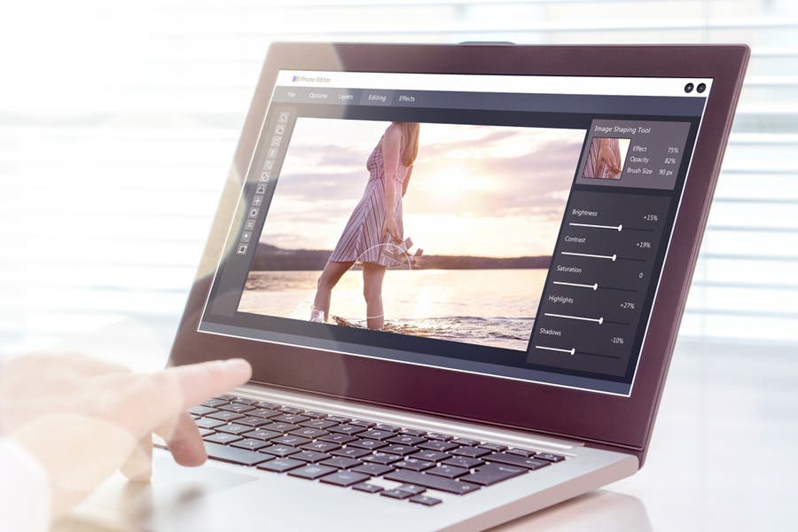 Photo editing software on laptop