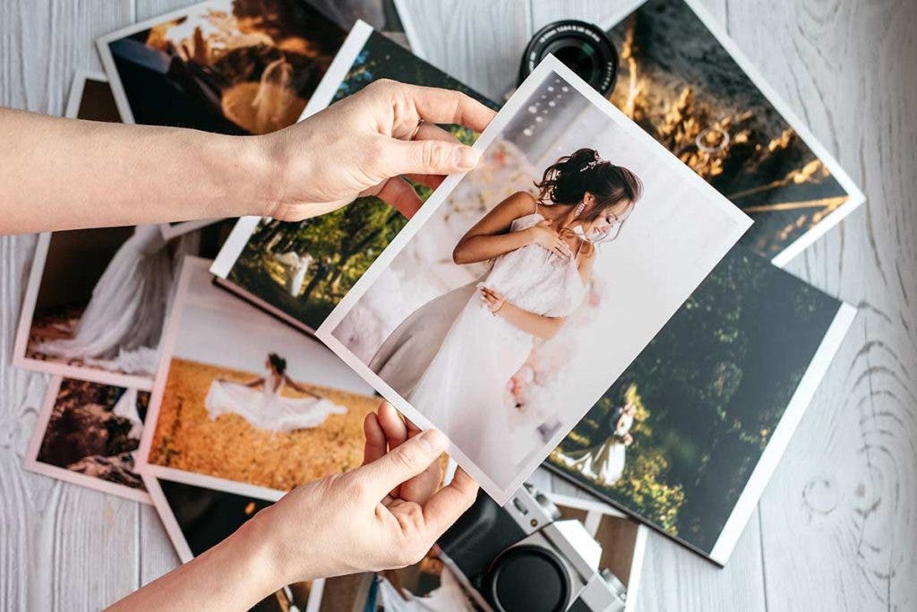 photographer with wedding photography portfolio pictures