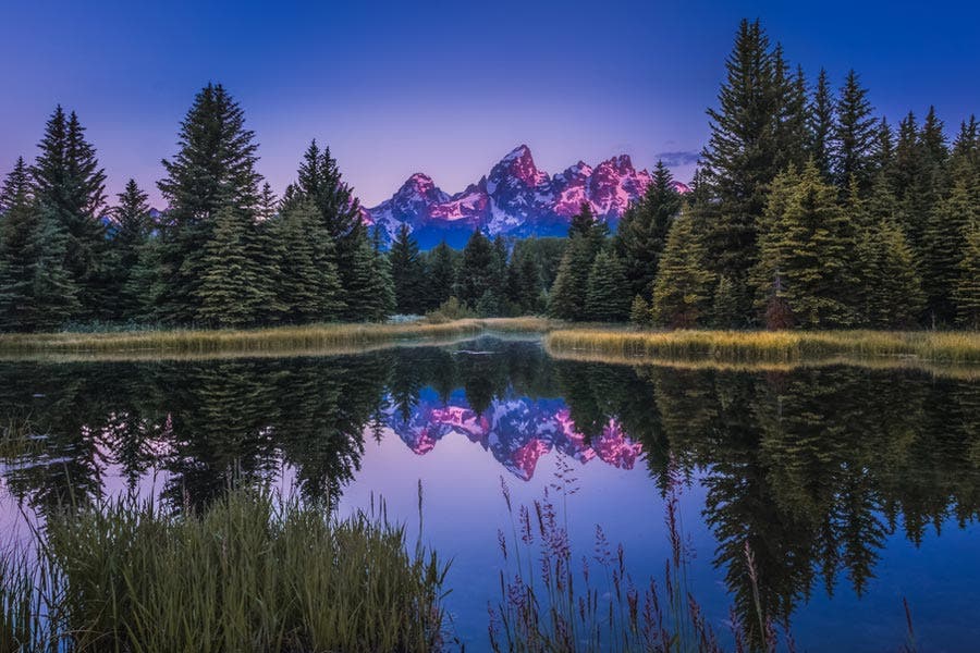 Color-filtered photo of sunrise reflection