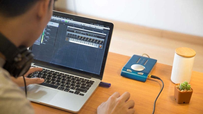 Music recording with Macbook laptop on work desk