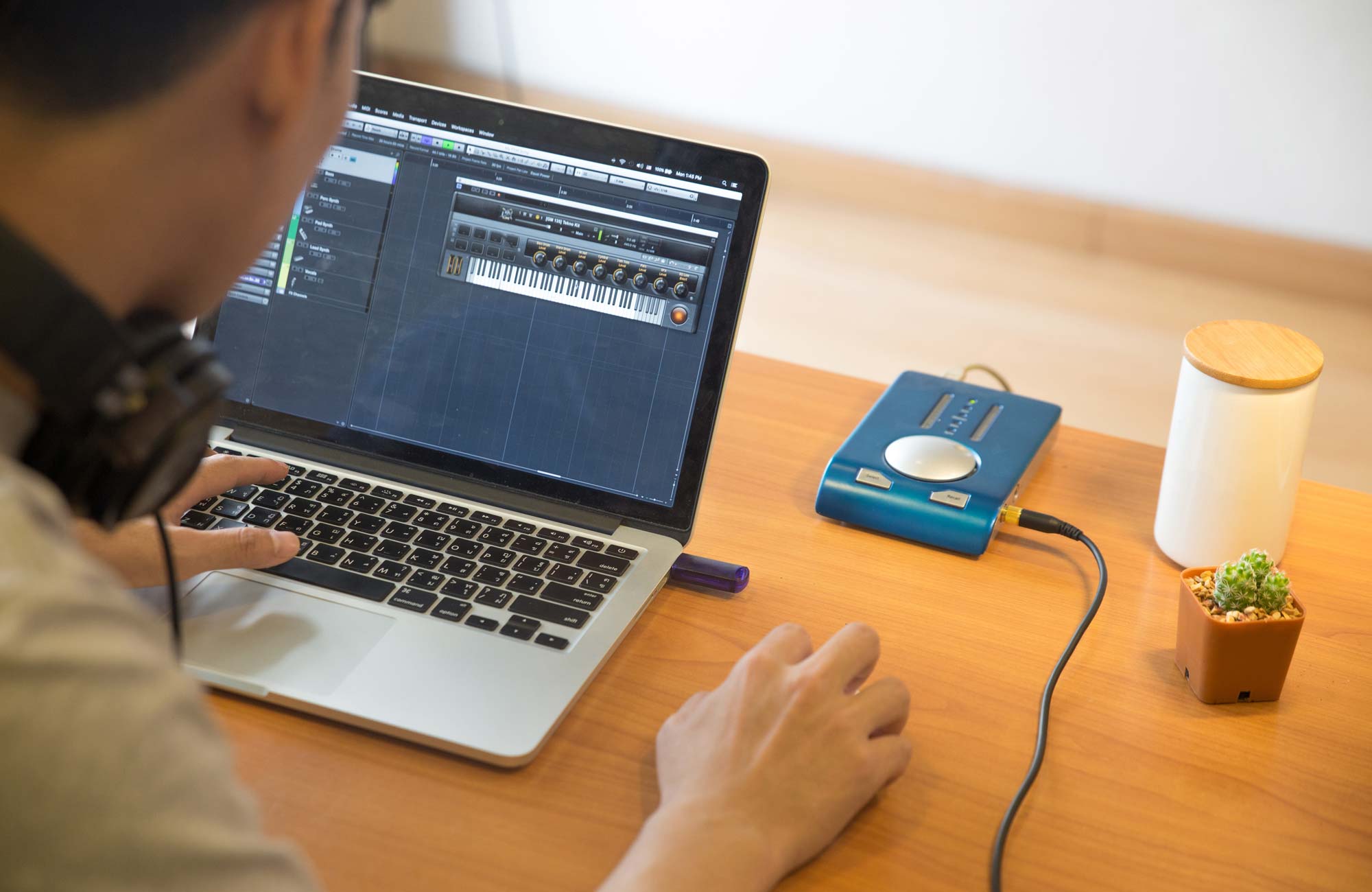 Music recording with Macbook laptop on work desk