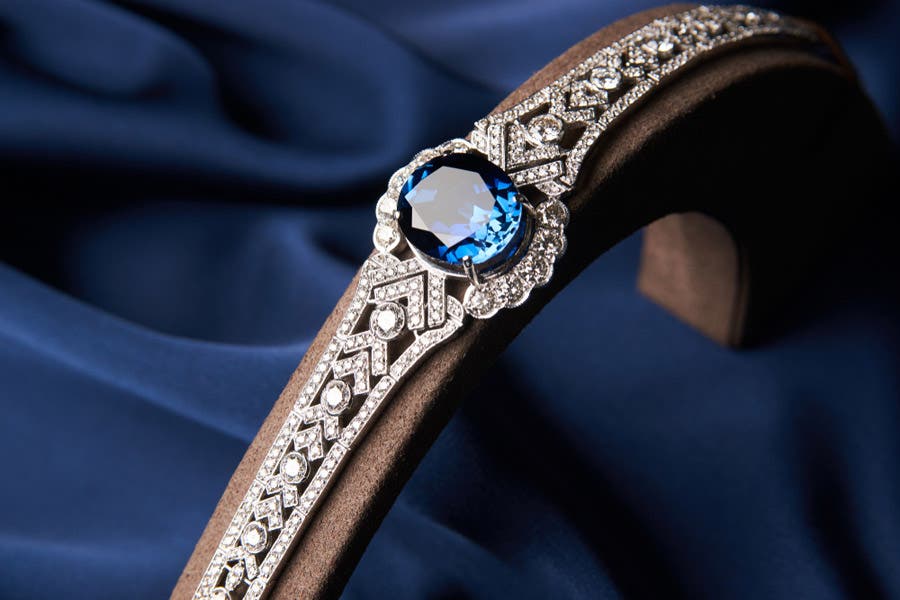 silver diamond bracelet with blue gemstone