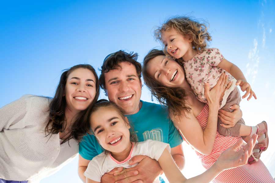 smiling family in a group portrait
