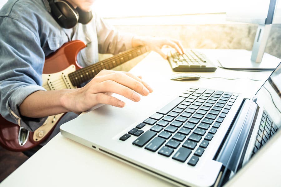 music producer making music at home
