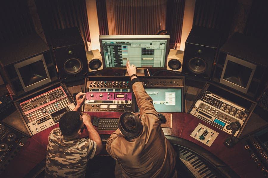 music producers working together in a studio