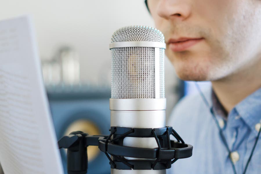 podcaster about to record with microphone